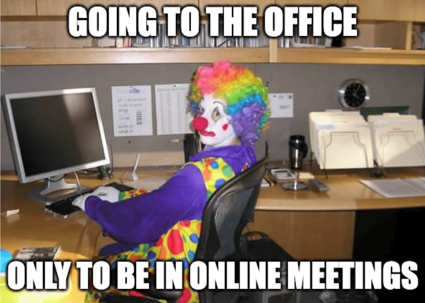 Clown working in the office