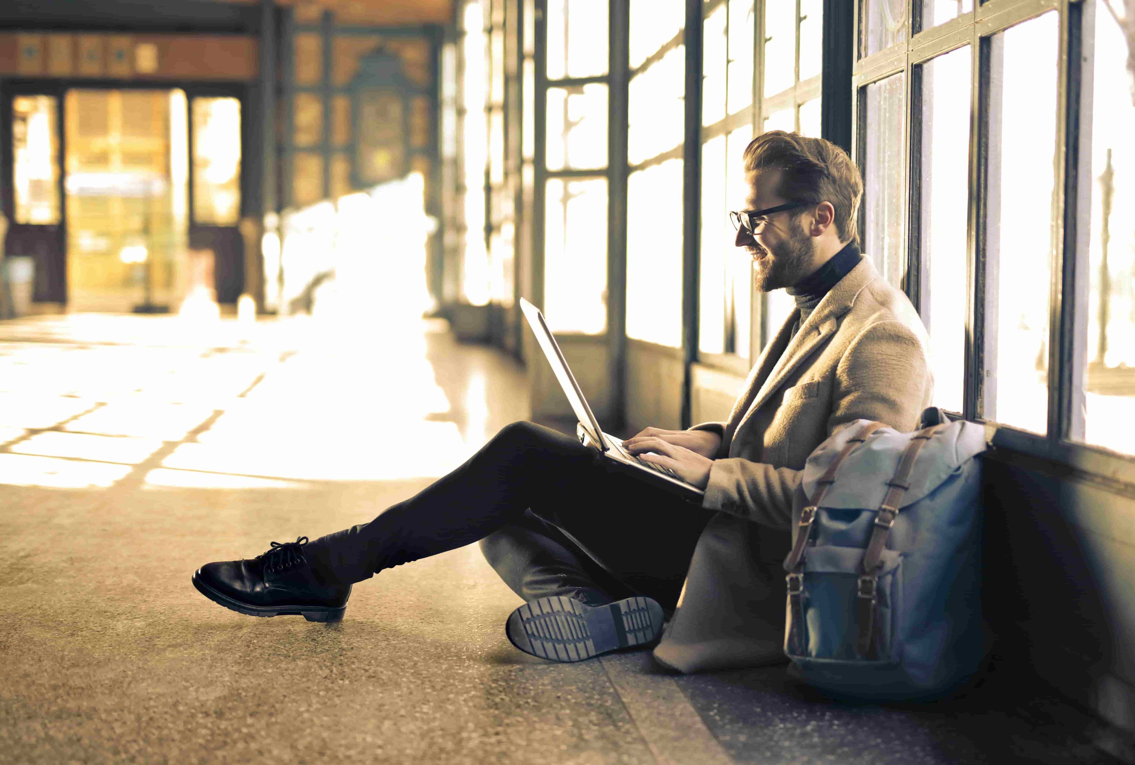 Person working outdoors wearing blue-light-filtering glasses